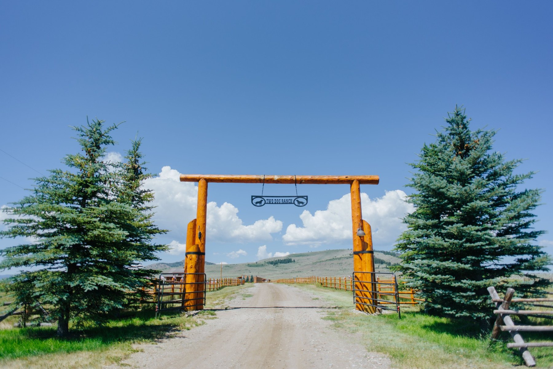Wood ranch entrance gate at Two Dog Ranch