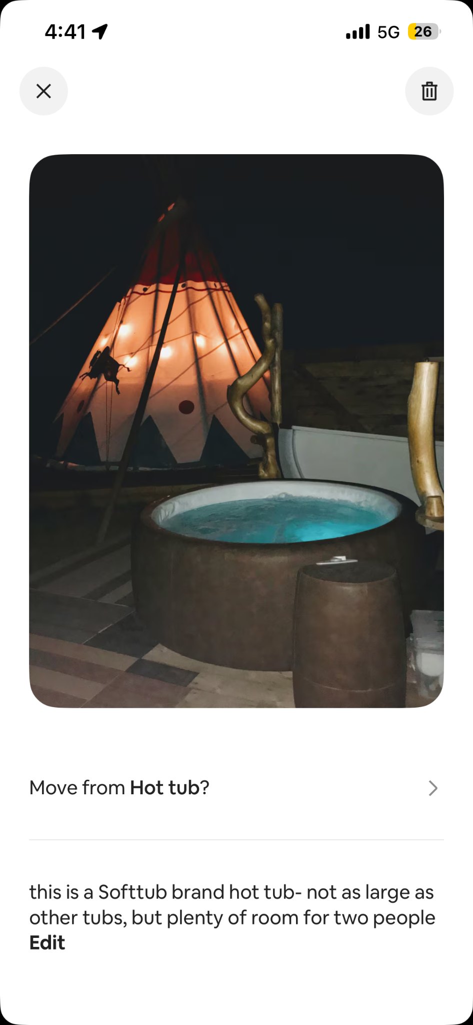 Softub hot tub at night outside the tipi